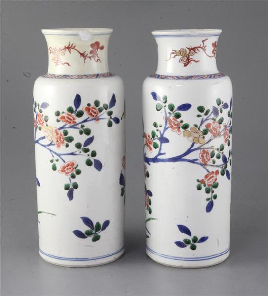 A pair of Chinese wucai cylindrical vases, Kangxi period, late 17th century, 26.5cm high, faults